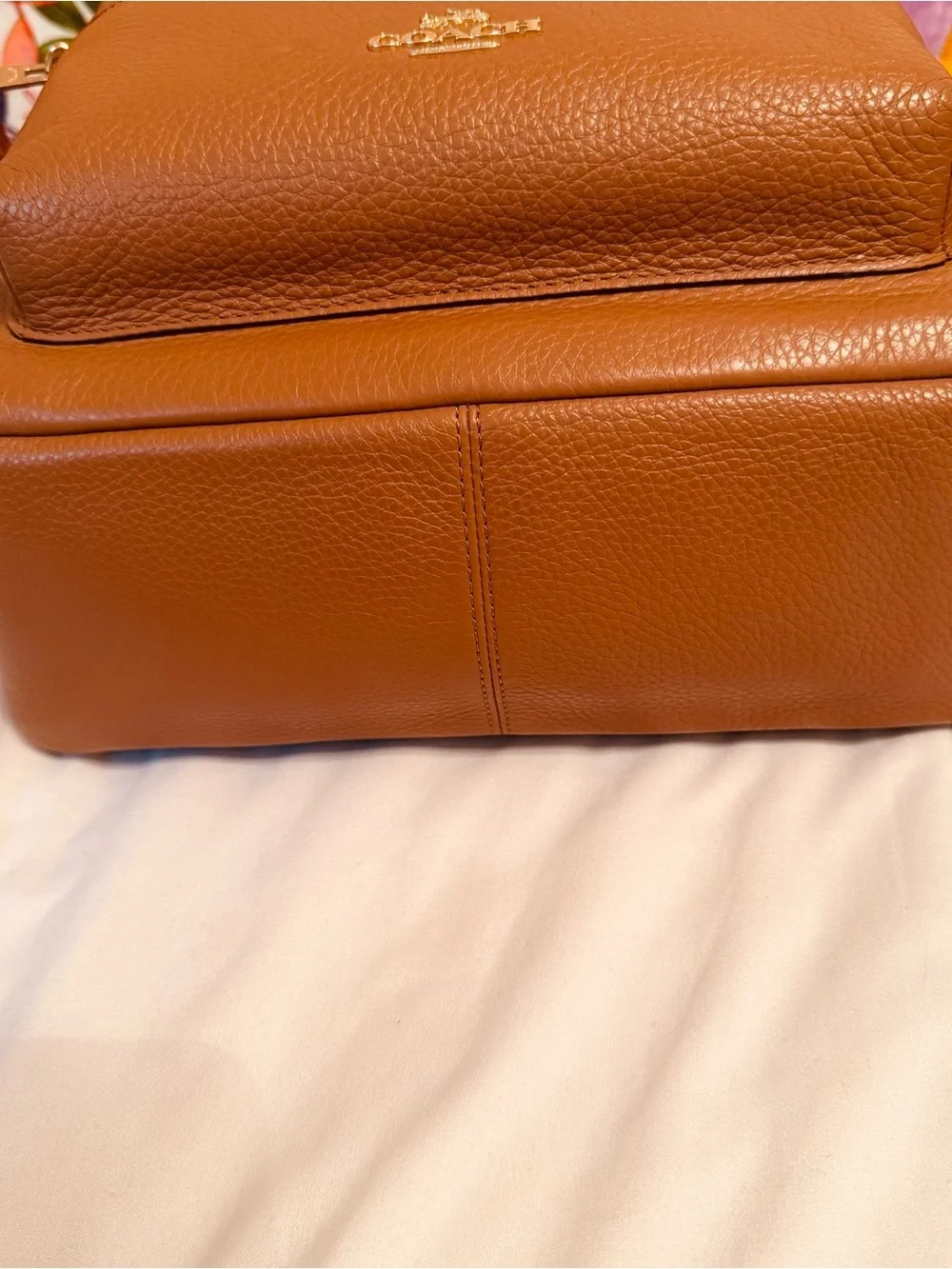 Coach Charlie medium size pebble leather backpack.